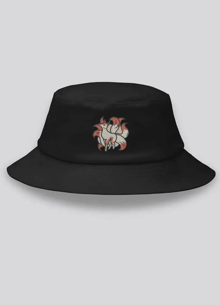 Black bucket hat with an embroidered fox motif patch